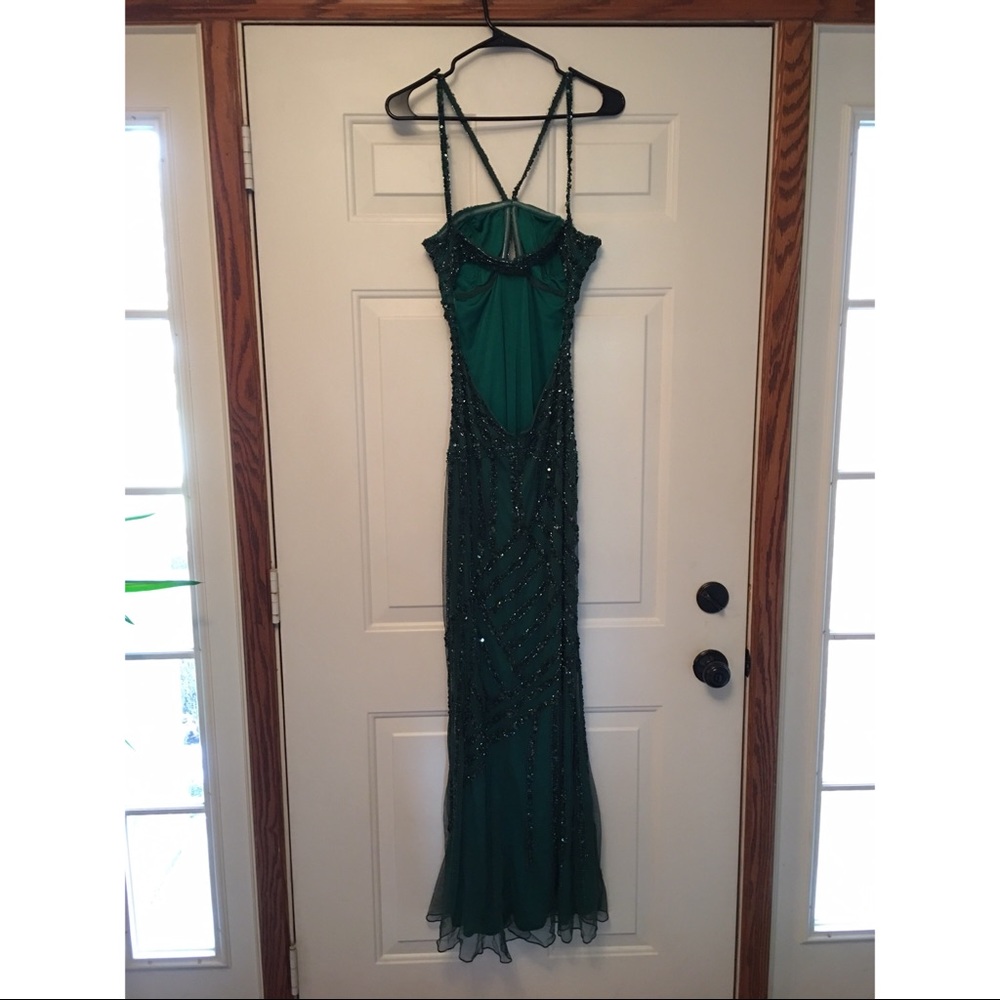 Dark green beaded faviana prom dress